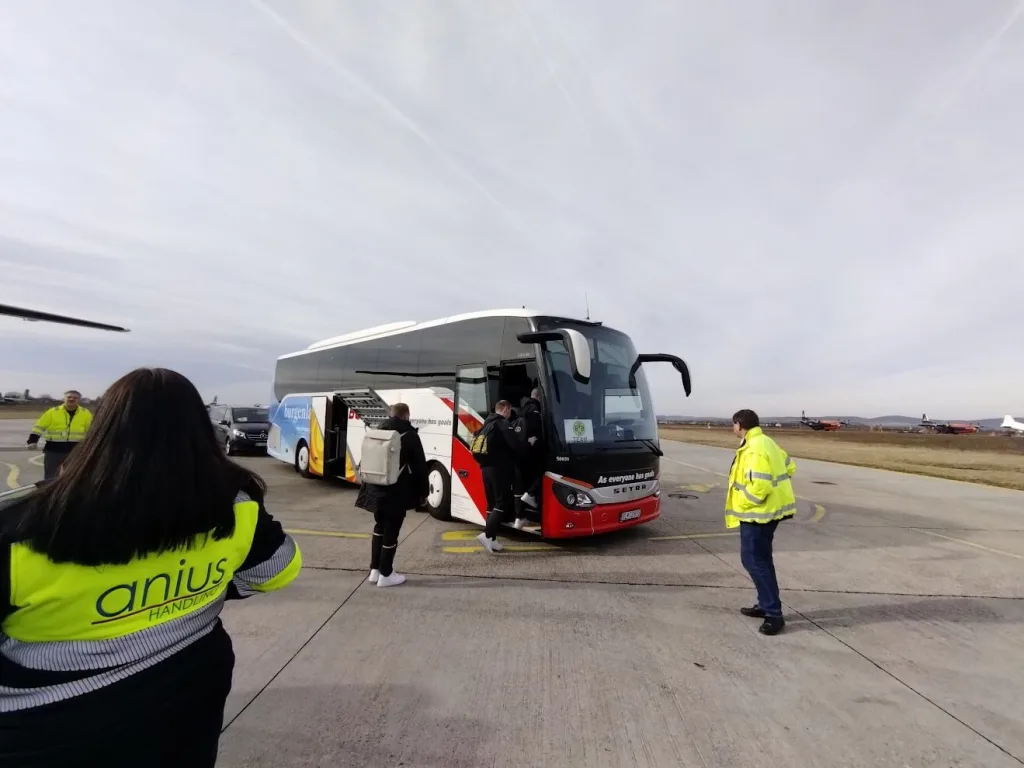 people getting on the bus of Blaguss at Piestany airport
