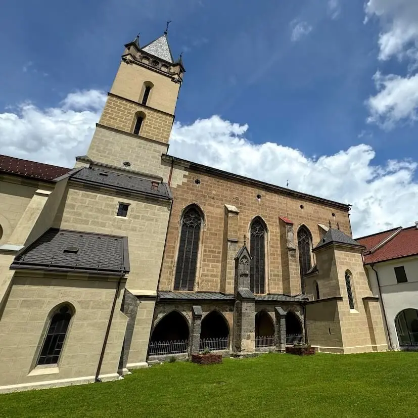 Exterior of St. Benedicts basilica in Hronsky Benadik abbey, which will clients visit during 6-day pilgrimage across Slovakia: Sacred Sites & Spiritual Heritage 