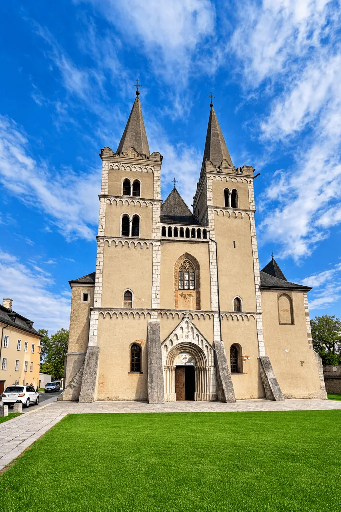 What a gorgeous shot of St. Martin's Cathedral at Spiš Chapter! 🏛️ Those twin towers against the blue sky are breathtaking. Let me slot it into the matching section right away