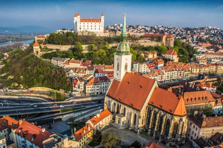 Bratislava’s old town from above, St Martin’s Cathedral in the foreground and the castle on its hill behind.