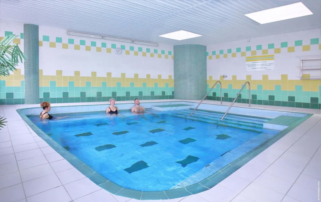 Guests relaxing in an indoor thermal pool at the Bojnice spa. Photo: www.fotogross.sk.