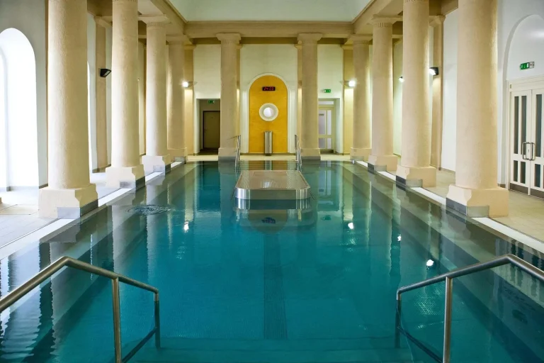 An indoor thermal pool lined with tall columns in Trenčianske Teplice.