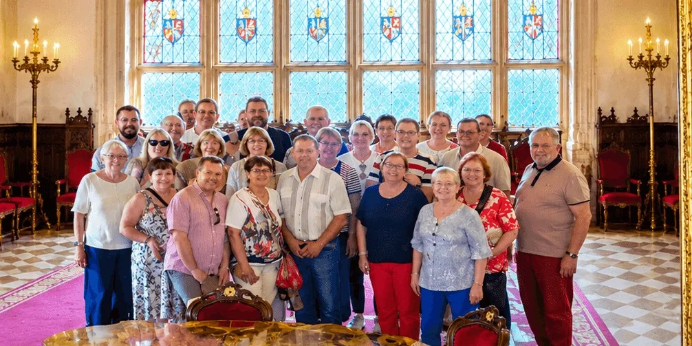 A tour group in the knights' hall at Bojnice Castle, Slovakia.