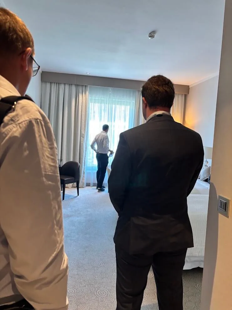 The e-travel team on a site inspection, checking a guest room at the Grand Hotel River Park in Bratislava.
