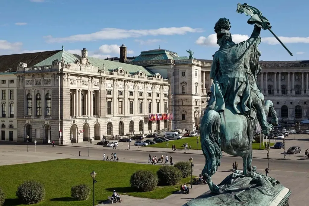 The bronze equestrian statue of Archduke Charles on Heldenplatz in Vienna, looking across the lawns to the Hofburg palace.